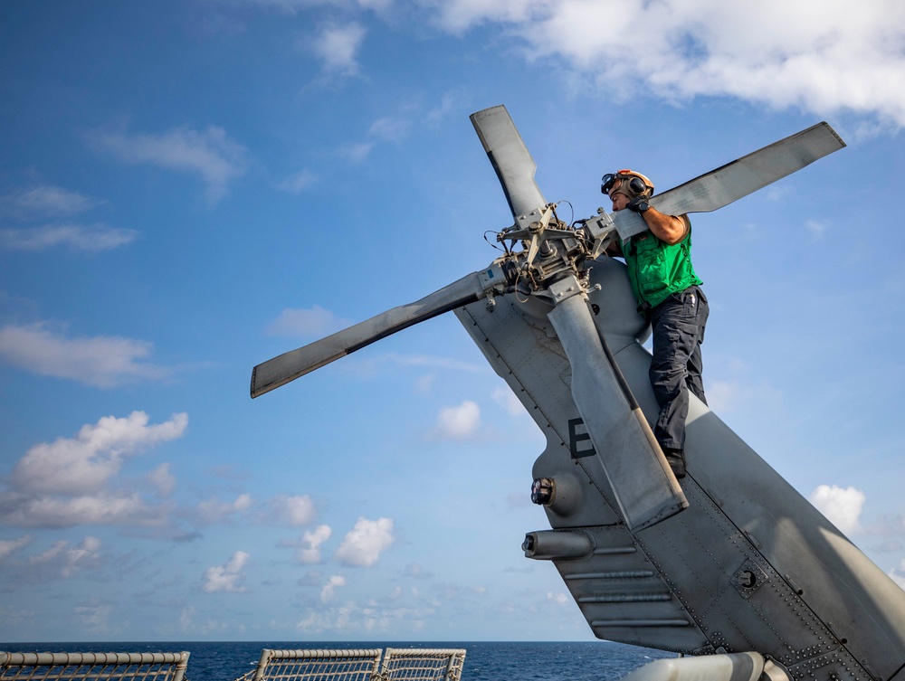 HSC 28 Sailor Conducts Maintenance on an MH-60S Sea Hawk Helicopter