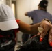 Mobile Barbershop provides haircuts to Afghan Evacuees at Fort Bliss’ Doña Ana Complex