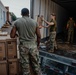 U.S. Marines and Army Soldiers help unload donated supplies in support of Operation Allies Welcome