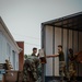 U.S. Marines and Army Soldiers help unload donated supplies in support of Operation Allies Welcome