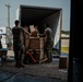 U.S. Marines and Army Soldiers help unload donated supplies in support of Operation Allies Welcome
