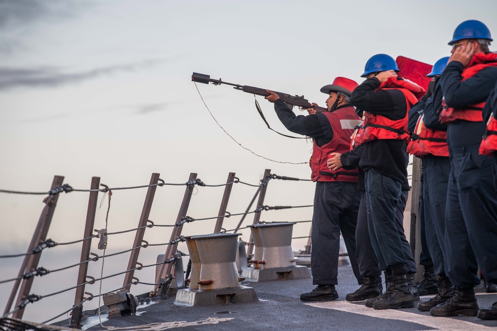 USS Mustin Sailor Prepares to Fire Shot Line