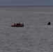 Coast Guard Cutter Healy crew member operations, during the first part of their Northwest Passage Deployment