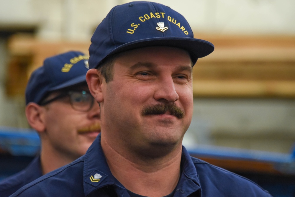 Coast Guard Cutter Healy crew member operations, during the first part of their Northwest Passage Deployment