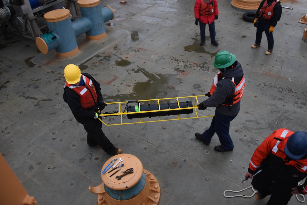 Coast Guard Cutter Healy crew member operations, during the first part of their Northwest Passage Deployment