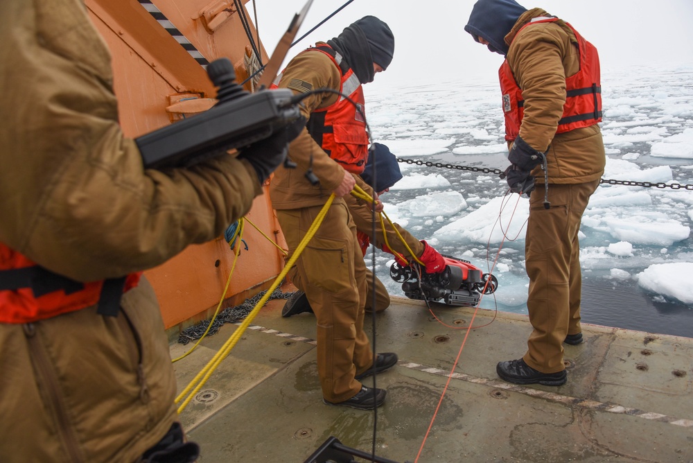 Coast Guard Cutter Healy crew member operations, during the first part of their Northwest Passage Deployment