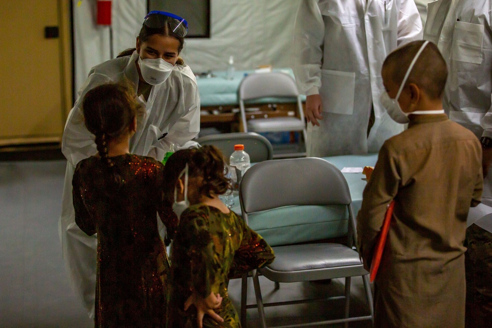 U.S. service members provide COVID vaccinations for Afghan civilians