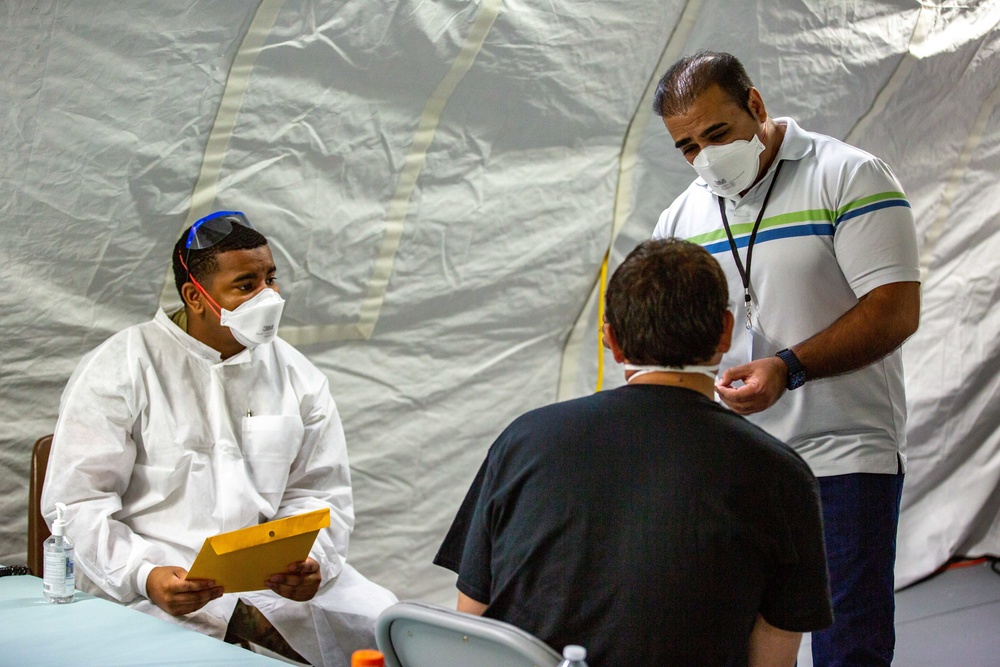 U.S. service members provide COVID vaccinations for Afghan civilians