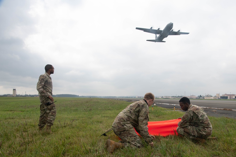 Yokota air traffic controllers conduct infield flightline operations for the first time