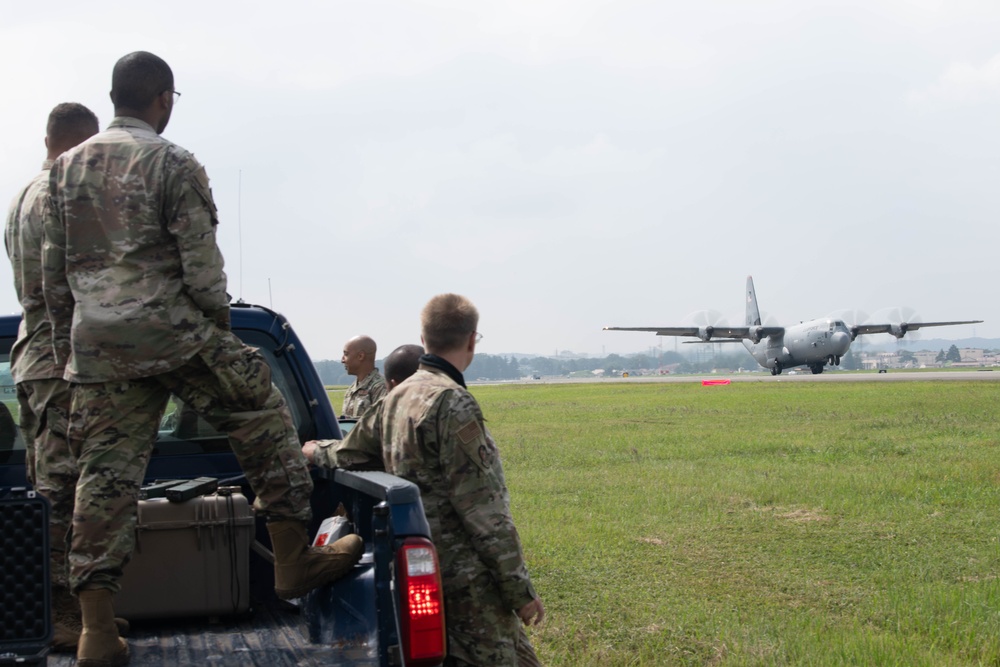 Yokota air traffic controllers conduct infield flightline for the first time