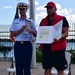 Coast Guard honors Michigan man who saved three girls struggling in the Detroit River