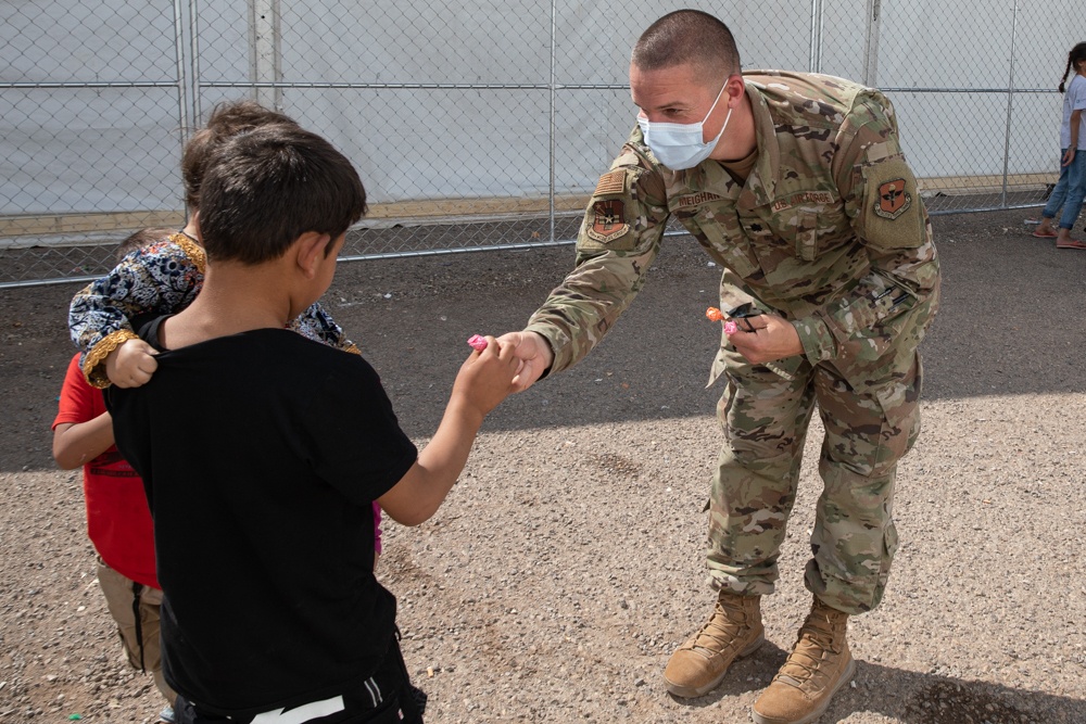 Airman spends time interacting with children in Aman Omid