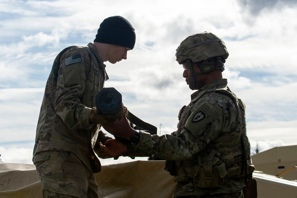 3 Geronimo paratroopers fire anti-tank weapons