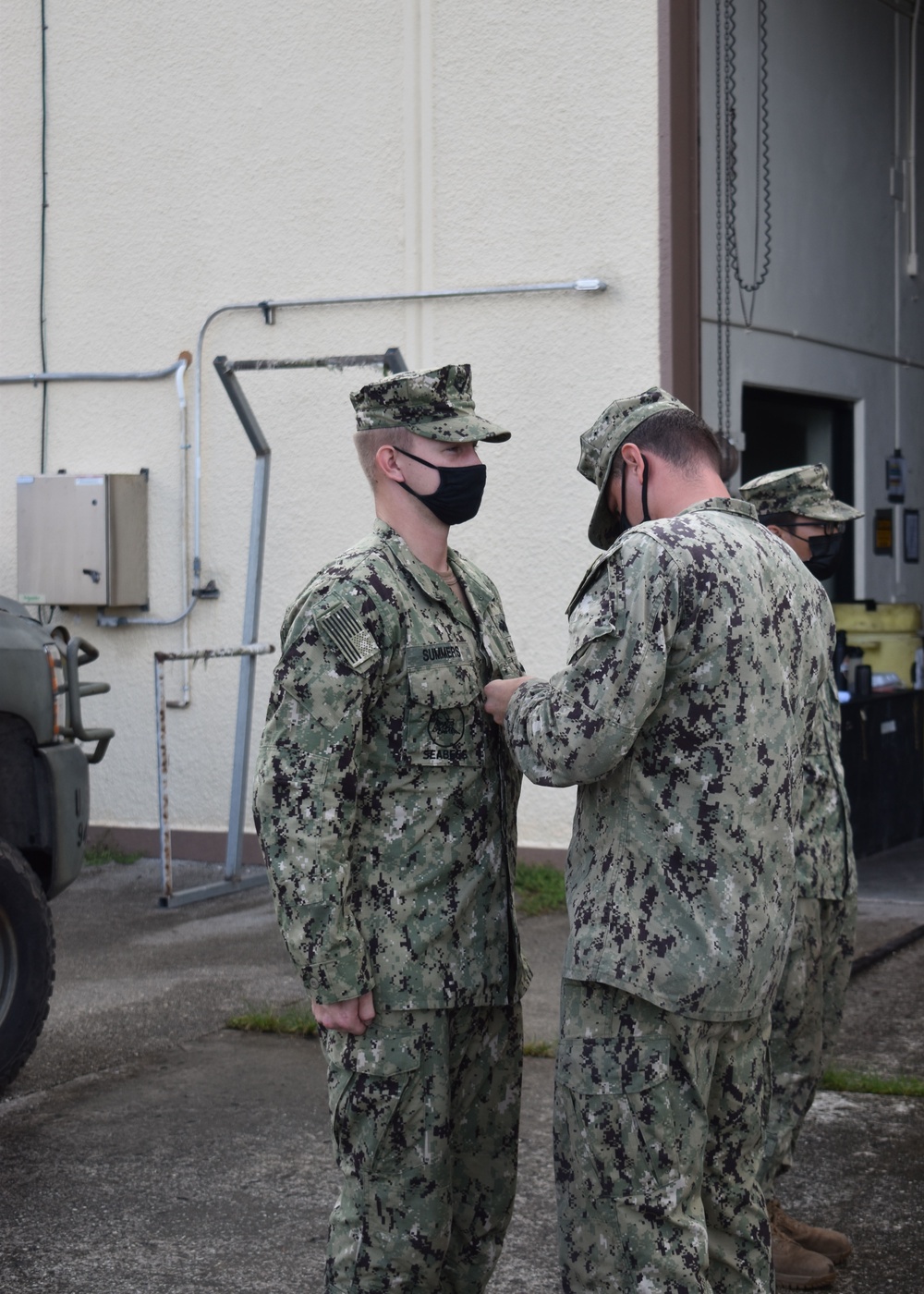 CM2 Hemmerle Promotes CM2 Summers to Petty Officer 2nd Class