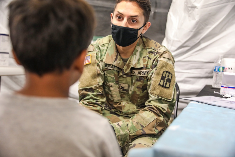 Afghan evacuees receive vaccinations at Fort Bliss’ Doña Ana Complex