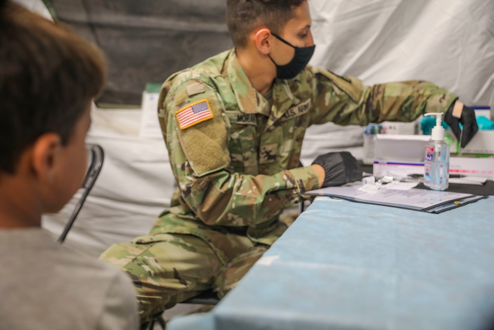 Afghan evacuees receive vaccinations at Fort Bliss’ Doña Ana Complex