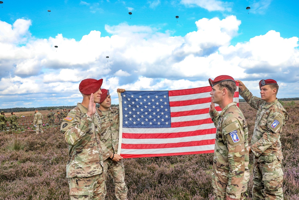 Soldier reenlists on drop zone in the Netherlands during NATO's largest technical Airborne exercise