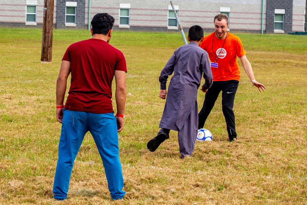 Afghan civilians attend Charlotte Eagles soccer camp during Operation Allies Welcome