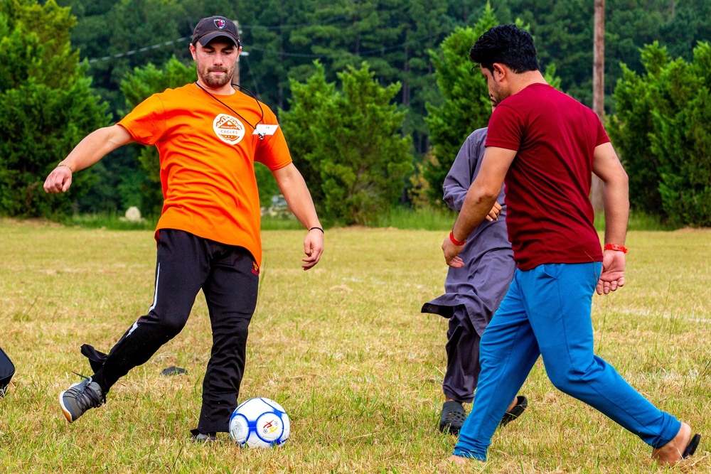 Afghan civilians attend Charlotte Eagles soccer camp during Operation Allies Welcome