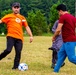 Afghan civilians attend Charlotte Eagles soccer camp during Operation Allies Welcome