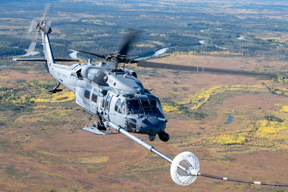 212th Rescue Squadron conducts tandem jump