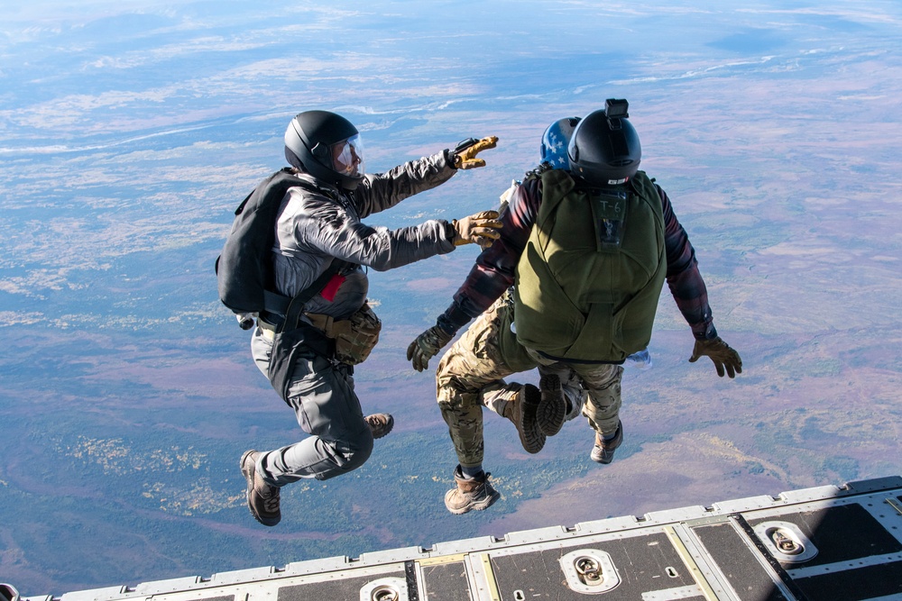 212th Rescue Squadron conducts tandem jump