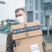 U.S. Marines with II MEF Unload Donations to Support OAW