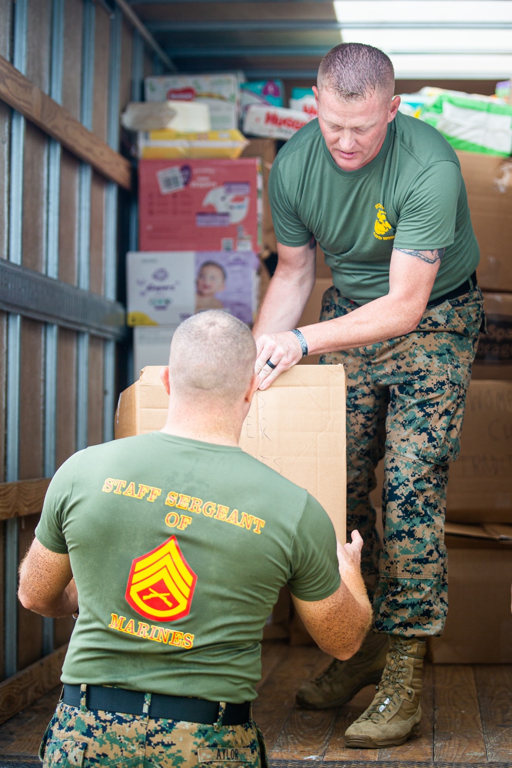 U.S. Marines with II MEF Unload Donations in Support of OAW