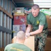 U.S. Marines with II MEF Unload Donations in Support of OAW