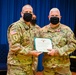 Former U.S. Army Reserve Cyber Protection Brigade Commander Col. Benjamin Bourgoyne receives the Meritorious Service Medal