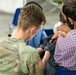 21st TSC gives Afghan evacuees Measles vaccine
