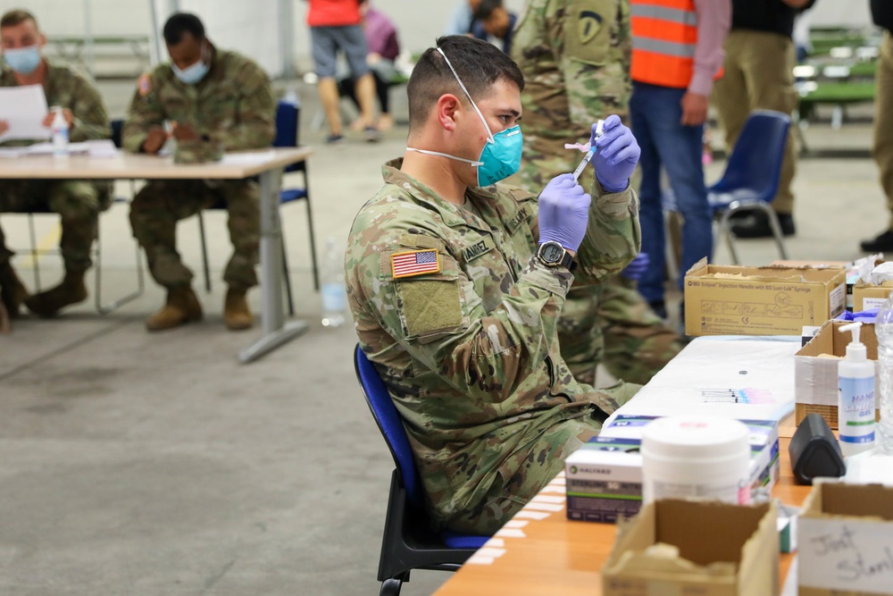 21st TSC gives Afghan evacuees Measles vaccine