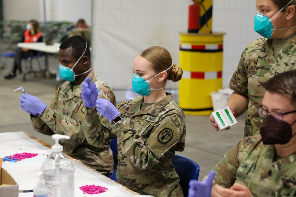 21st TSC gives Afghan evacuees Measles vaccine