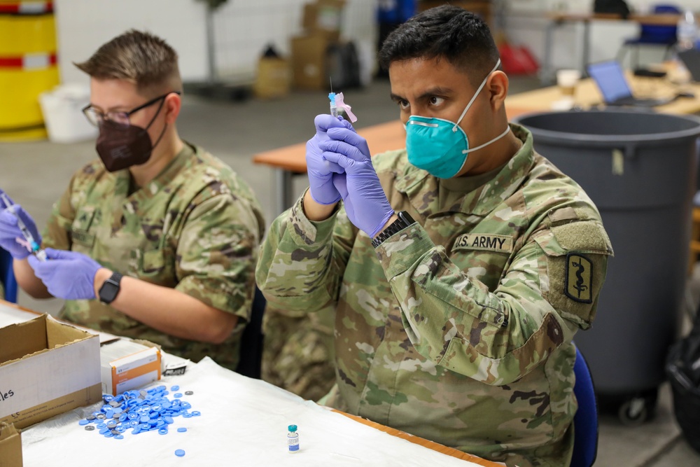 21st TSC gives Afghan evacuees Measles vaccine
