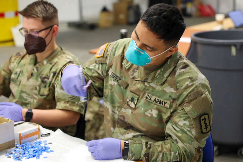 21st TSC gives Afghan evacuees Measles vaccine