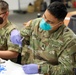 21st TSC gives Afghan evacuees Measles vaccine