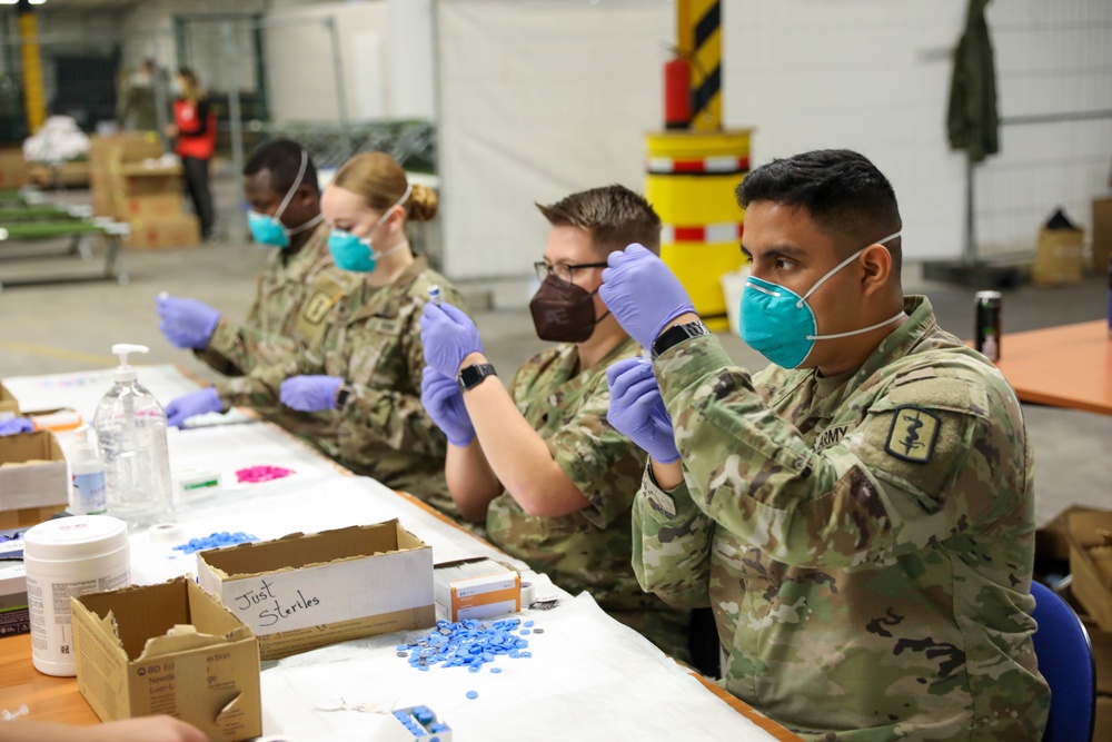 21st TSC gives Afghan evacuees Measles vaccine