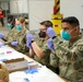 21st TSC gives Afghan evacuees Measles vaccine