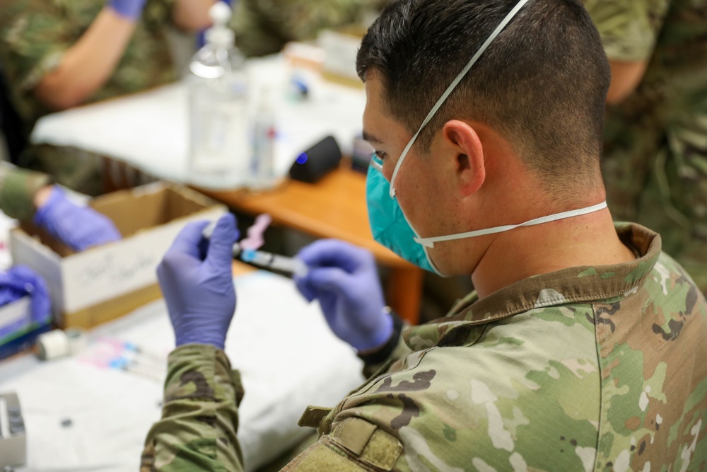 21st TSC gives Afghan evacuees Measles vaccine