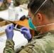 21st TSC gives Afghan evacuees Measles vaccine