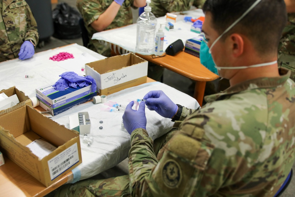 21st TSC gives Afghan evacuees Measles vaccine