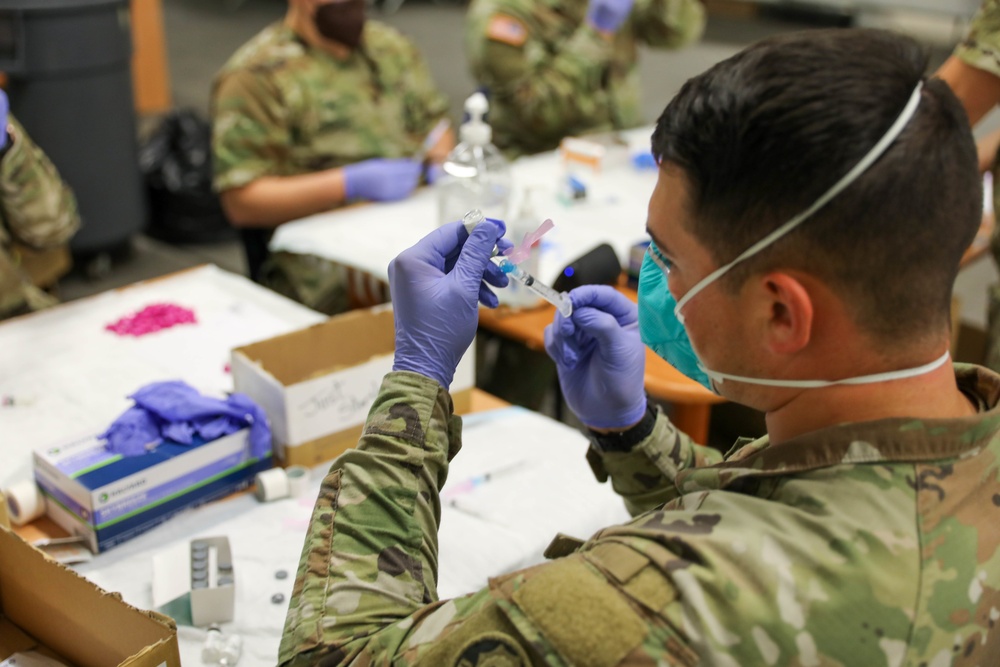 21st TSC gives Afghan evacuees Measles vaccine