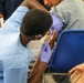 21st TSC gives Afghan evacuees Measles vaccine