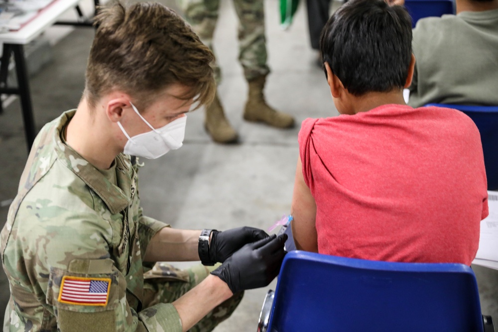 21st TSC gives Afghan evacuees Measles vaccine