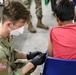 21st TSC gives Afghan evacuees Measles vaccine