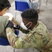 21st TSC gives Afghan evacuees Measles vaccine