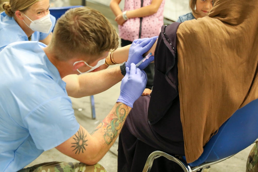 21st TSC gives Afghan evacuees Measles vaccine