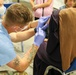 21st TSC gives Afghan evacuees Measles vaccine