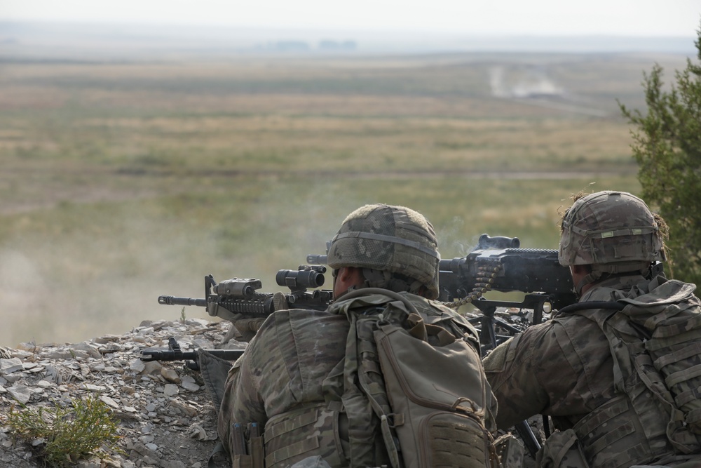 Support by fire suppresses target during platoon live fire