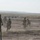 Dismounts move to trench during platoon live fire exercises